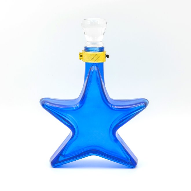 Fancy Star Shaped Unique Glass Bottle