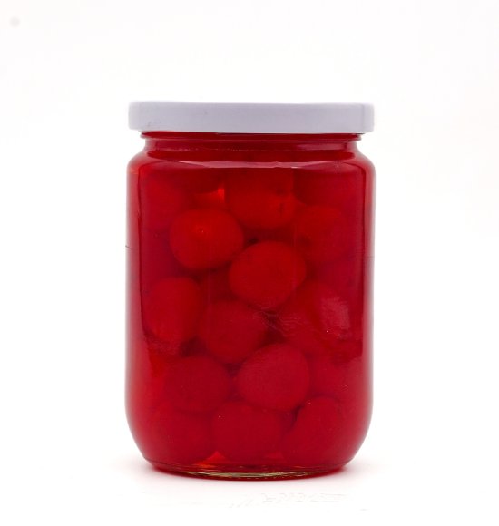 Canned red pitted cherries without stem