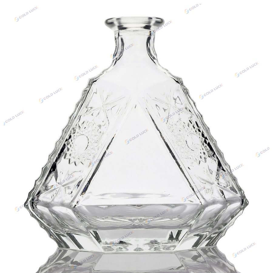 Triangular carved brandy spirits glass bottle