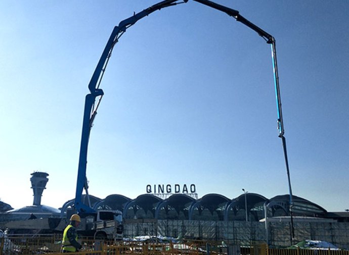 Large concrete pump truck construction site