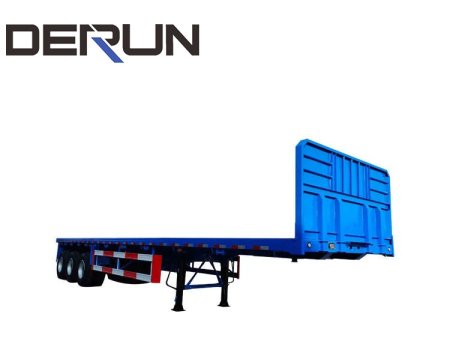 How is the flat bed trailer transported in a container?
