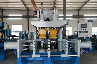 Coated sand shell making machine (also known as shell core machine or core shooter)