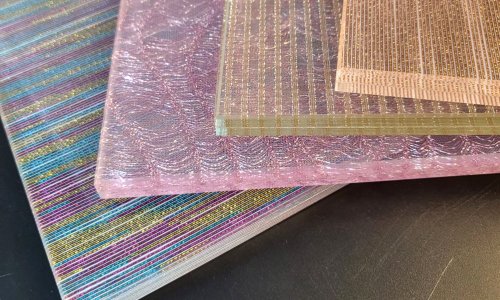 Fabric laminated glass