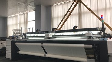Tongda develop new model air jet loom TDA910 with better performance