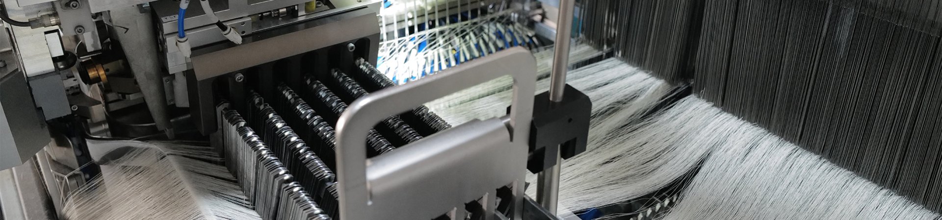 Automatic Drawing-in Machine