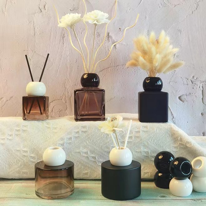 Botella de vidrio vacía redonda lateral transparente para perfume