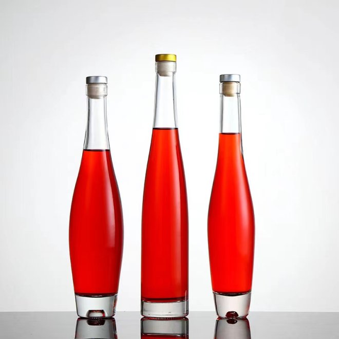 Botella de agua con gas redonda y vacía de vidrio Flint