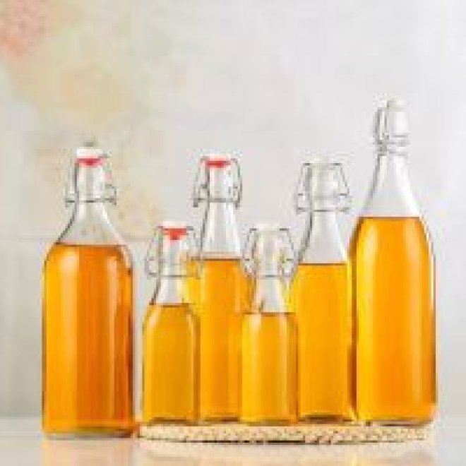 Botellas de vidrio transparentes para bebidas y zumos