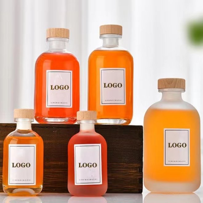 Botellas de vidrio redondas de 250 ml 300 ml 500 ml para zumo de té