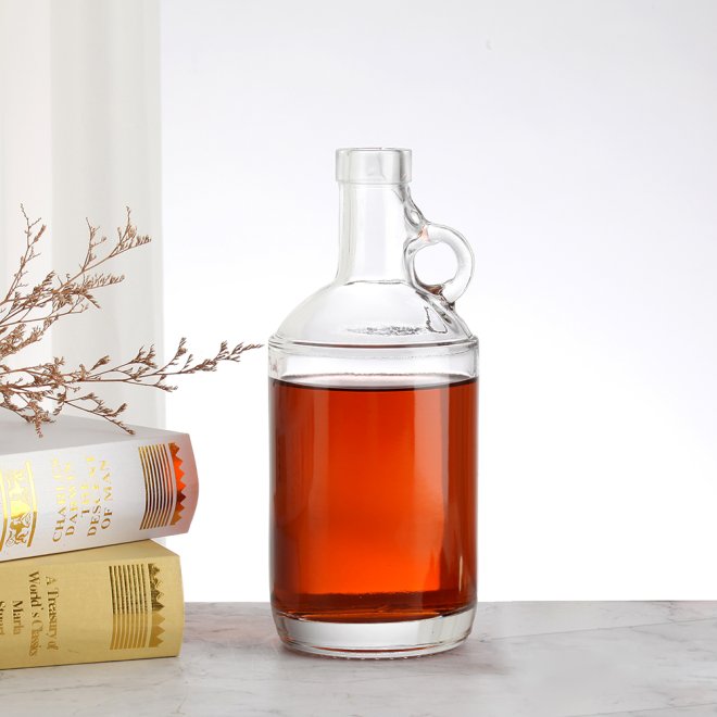 Botella de vidrio para aceite con tapón y logotipo personalizado al por mayor