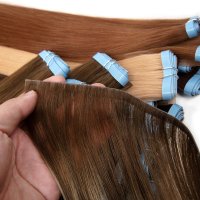 Long strip tape-in weft hair extension